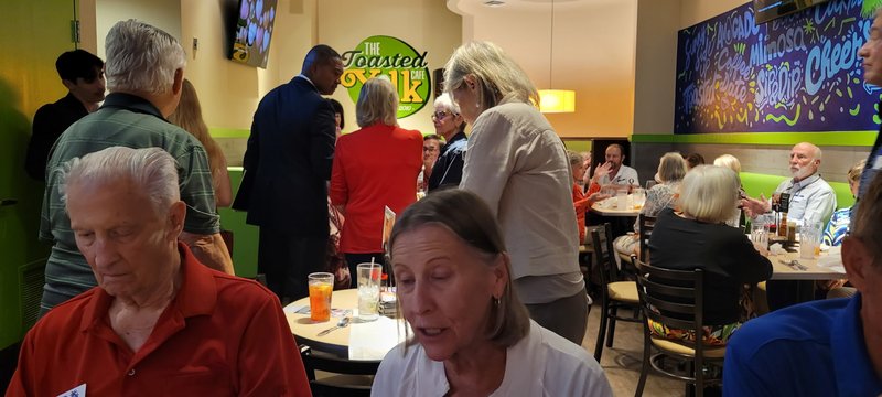 Victor Arias at a community event with supporters across Southwest Florida