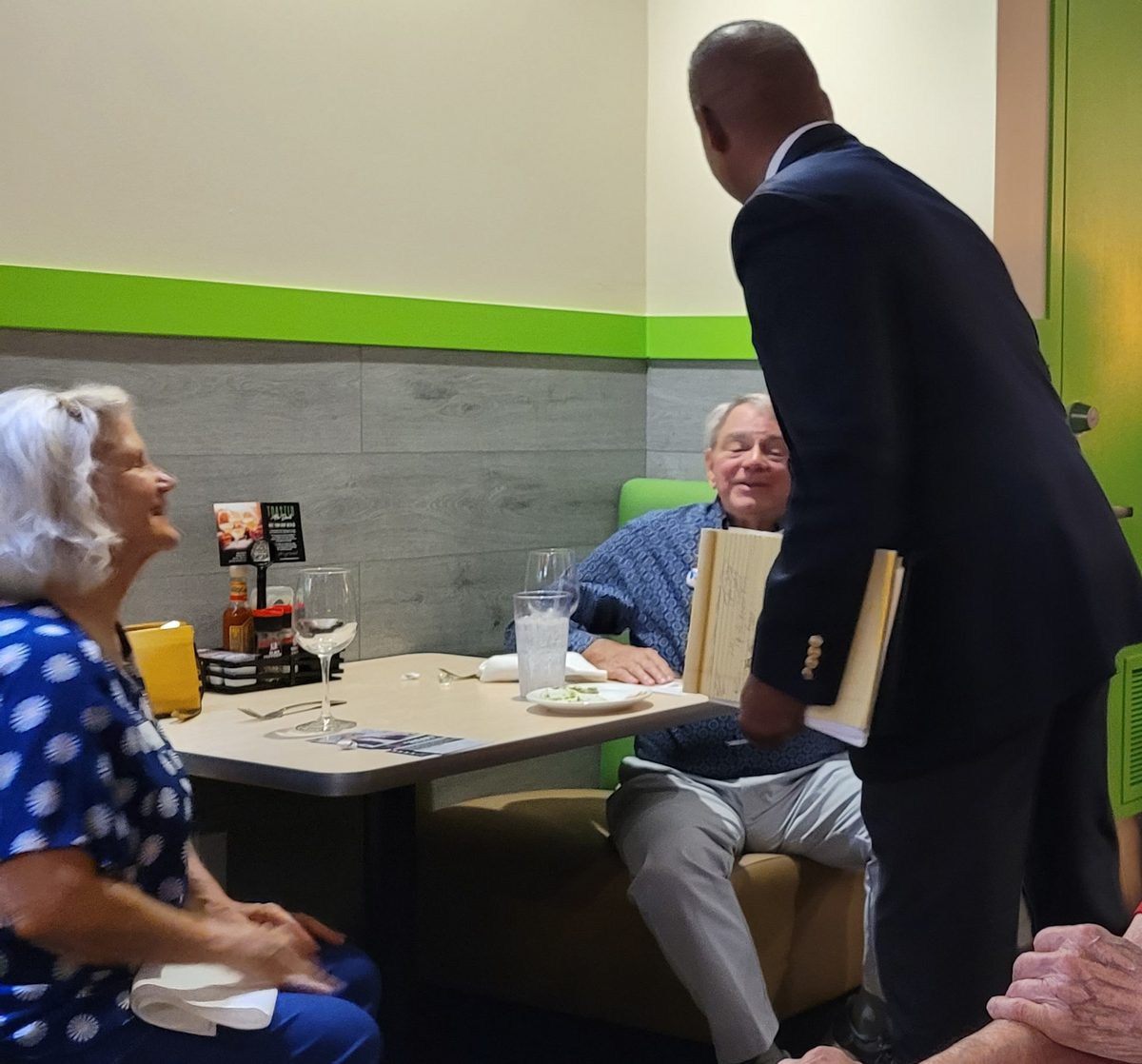 Victor Arias meeting with constituents at a Southwest Florida seafood restaurant