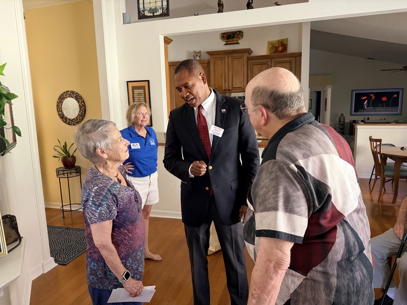 Victor Arias visiting a senior constituent at home to discuss healthcare and Medicare concerns