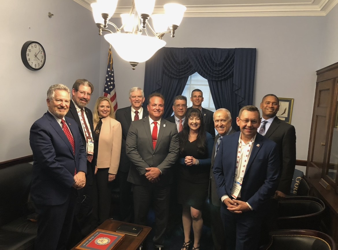 Victor Arias with Suncoast Credit Union board members in a U.S. Capitol office after advocating for financial access for Southwest Florida families